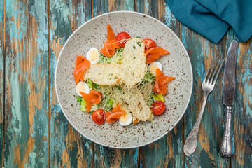 Caesar salad with salmon