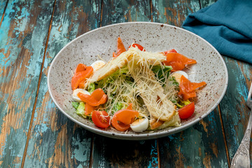 Caesar salad with salmon