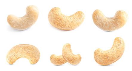 Set of different delicious organic cashew nuts on white background