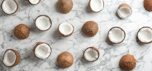 Coconut pattern on marble table, flat lay