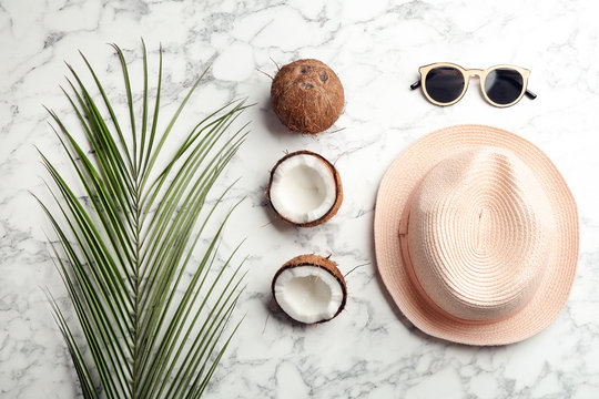 Flat lay composition with coconuts on marble background