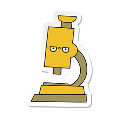 sticker of a cute cartoon microscope