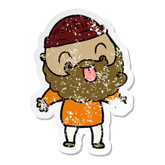 distressed sticker of a man with beard sticking out tongue