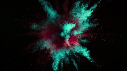 Super slowmotion shot of color powder explosion isolated on black background.