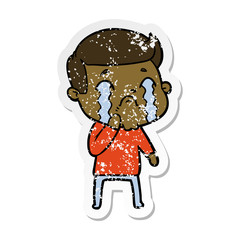 distressed sticker of a cartoon man crying