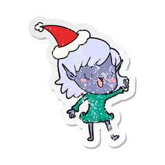 distressed sticker cartoon of a elf girl wearing santa hat