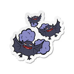 sticker of a cartoon vampire bats