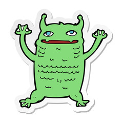 sticker of a cartoon little monster