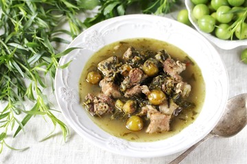 green plum  with Meat stew and greens. Georgian dish 