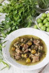 green plum  with Meat stew and greens. Georgian dish 