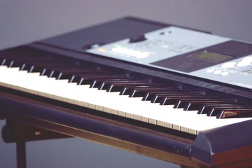 blurred Electronic musical keyboard synthesizer close-up