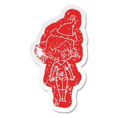 cartoon distressed sticker of a happy woman wearing santa hat