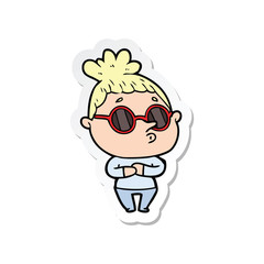 sticker of a cartoon woman wearing sunglasses