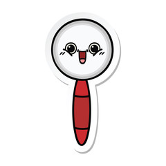 sticker of a cute cartoon magnifying glass