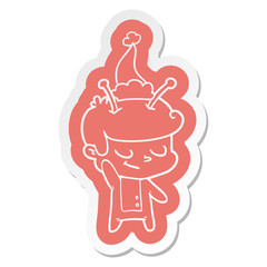 friendly cartoon  sticker of a spaceman wearing santa hat