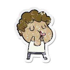 distressed sticker of a cartoon man pulling face