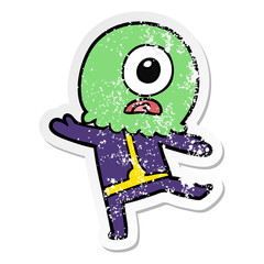 distressed sticker of a cartoon cyclops alien spaceman