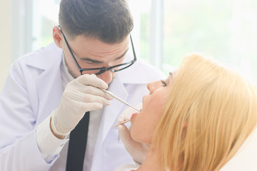 Dentist, oral health before treatment or treatment for beauty.