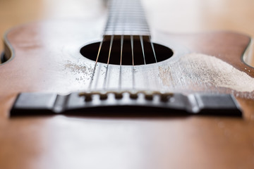 Fototapeta premium Scratches on the old acoustic guitar