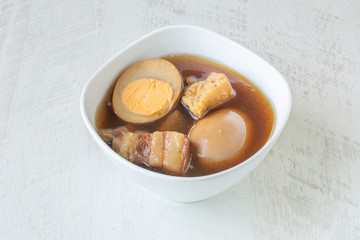 Egg and Pork in Sweet Brown Sauce on white background.