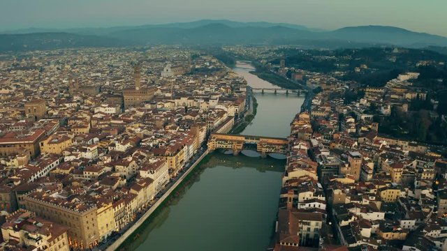 Aerial shot of Ponte Vecchio historic bridge and cityscape of Florence, Italy