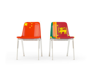 Two chairs with flags of China and sri lanka