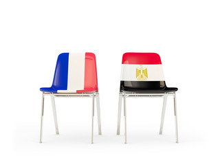 Two chairs with flags of France and egypt
