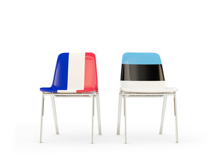 Two chairs with flags of France and estonia