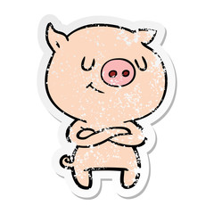 distressed sticker of a happy cartoon pig with crossed arms