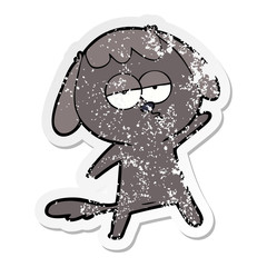 distressed sticker of a cartoon bored dog