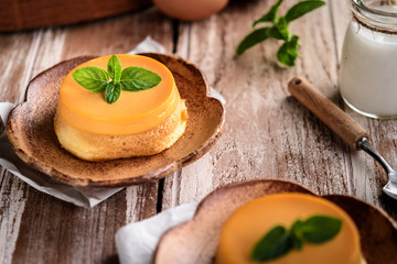 homemade caramel custard pudding with mint