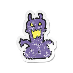 retro distressed sticker of a cartoon little alien