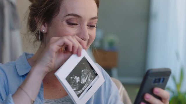 happy woman showing ultrasound photo sharing pregnancy with family using smartphone having video chat revealing exciting news