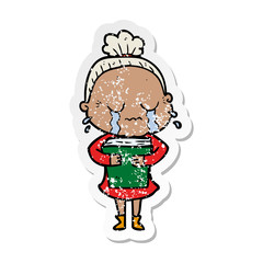 distressed sticker of a cartoon crying old lady