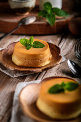 homemade caramel custard pudding with mint