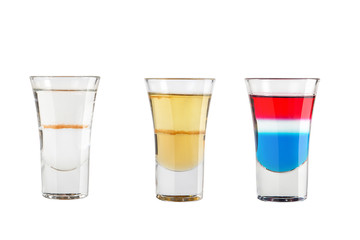 Set of alcohol shots on a white background. Three shots of popular and diverse.