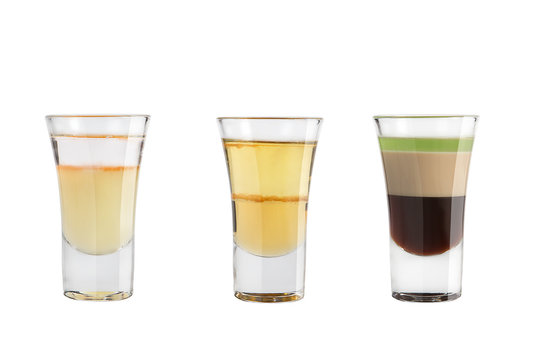 Set of alcohol shots on a white background. Three shots of interesting popular.