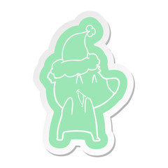 laughing polar bear cartoon  sticker of a wearing santa hat