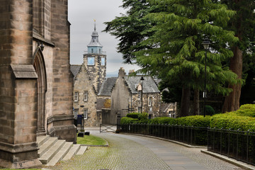 Road at Church of the Holy Rude leading to Stirling Boys Club and The Tolbooth clock tower on...