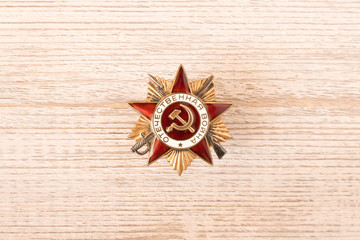 The order of the Great Patriotic war on an wooden table. Filmed in Minsk, Belarus  may 9,2018.