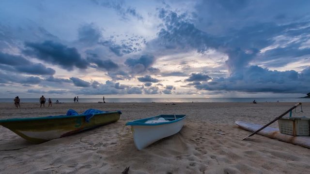 Time - lapse boat with sunset at karon bech
