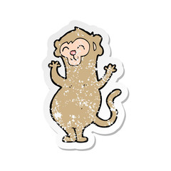 retro distressed sticker of a cartoon monkey