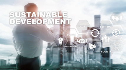 Fototapeta na wymiar Sustainable development, ecology and environment protection concept. Renewable energy and natural resources. Double exposure of success businessman with abstract building