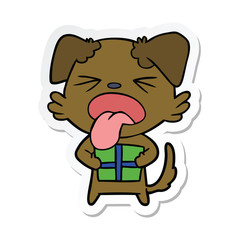 sticker of a cartoon dog with christmas present