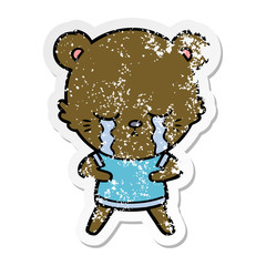 distressed sticker of a crying cartoon bear
