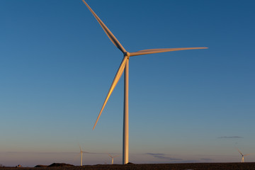 Fototapeta premium Windmill at sunset