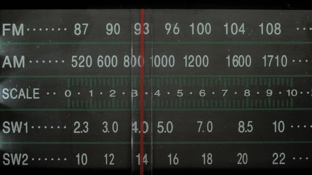 Frequency Label Moves in Scale of Analog Vintage Radio Tuning Control Panel