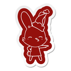 curious bunny cartoon  sticker of a wearing santa hat