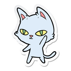 sticker of a cartoon cat waving