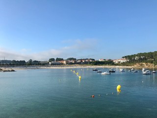 View from the pier with boats at the distance in Sanxenxo Galicia Spain